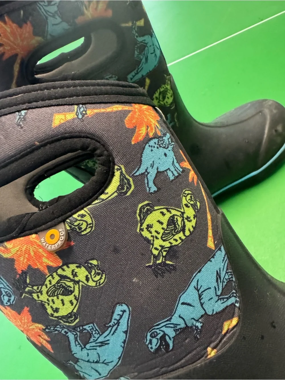 Bogs dinosaur print boots size 3-4  Black Boots